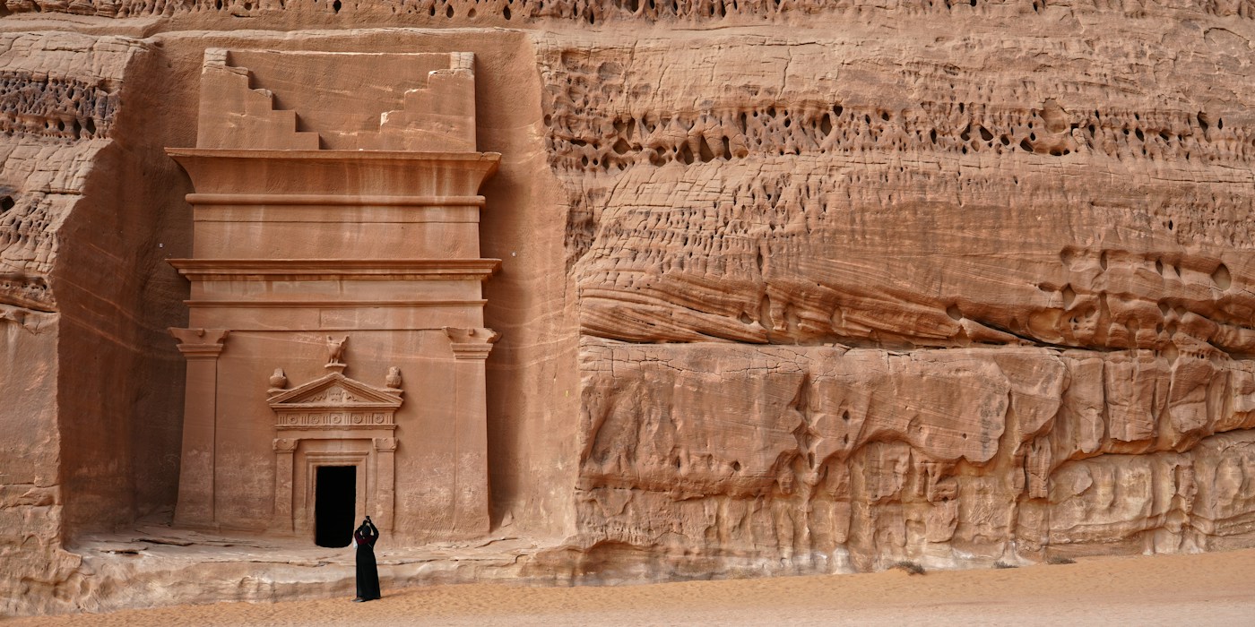 A carved Nabataean sandstone tomb in Hegra, AlUla