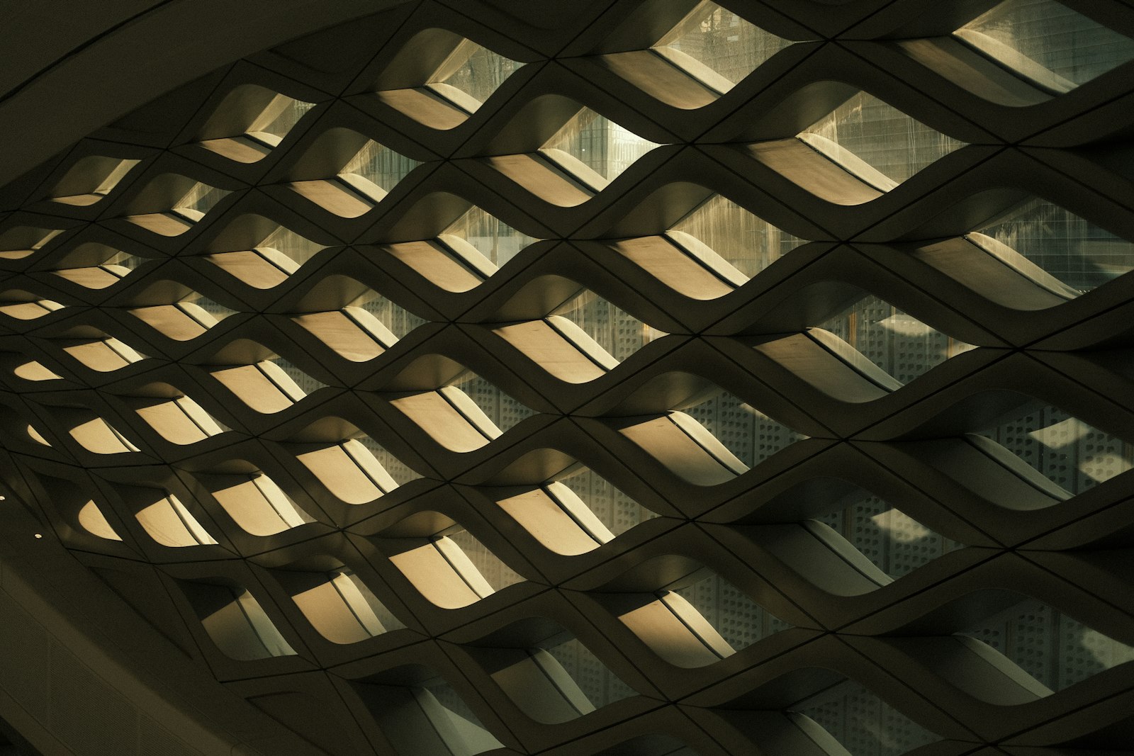 A modern patterned ceiling structure in KAFD, Riyadh